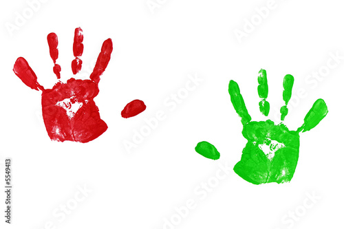 close up red child handprints on white