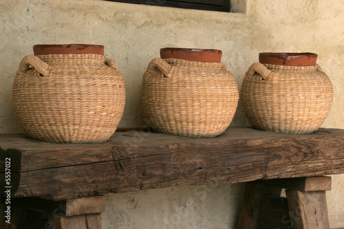 Terra Cotta urns wrapped in Raffia, Baja, Mexico