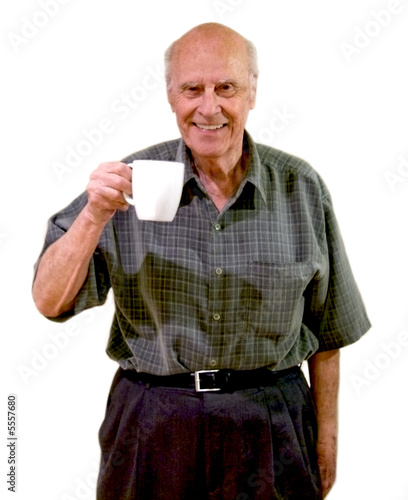 Senior smiling holding cup of coffee