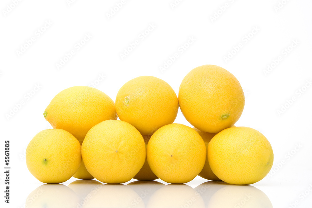 group of fresh lemons isolated against white background