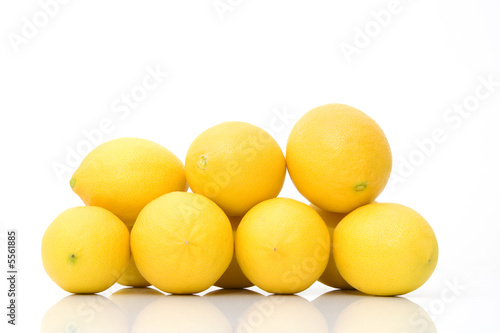 group of fresh lemons isolated against white background