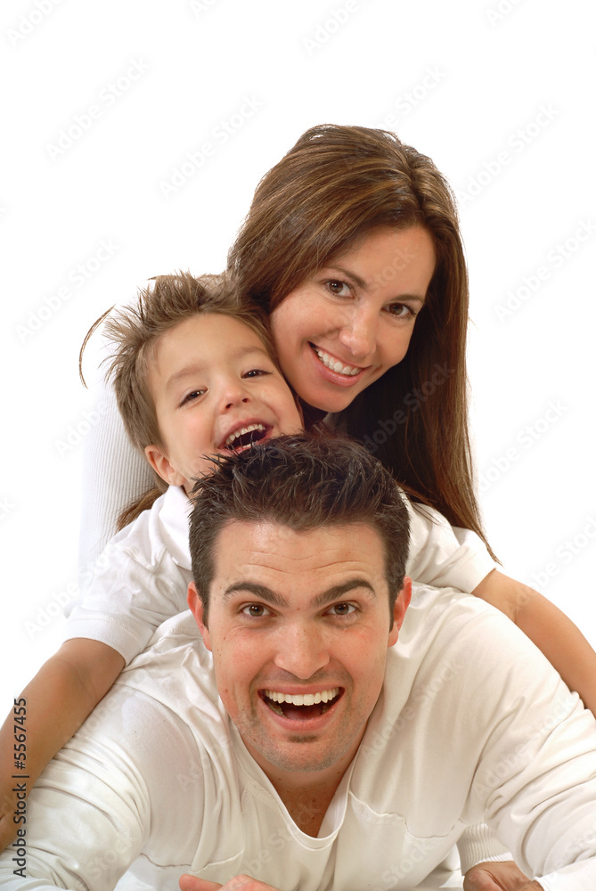 Excited, happy young family in a joyful huddle