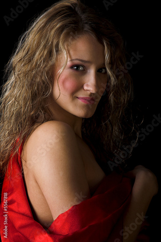 young beauty girl with long curly hair