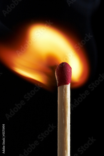 close up macro of a match on fire