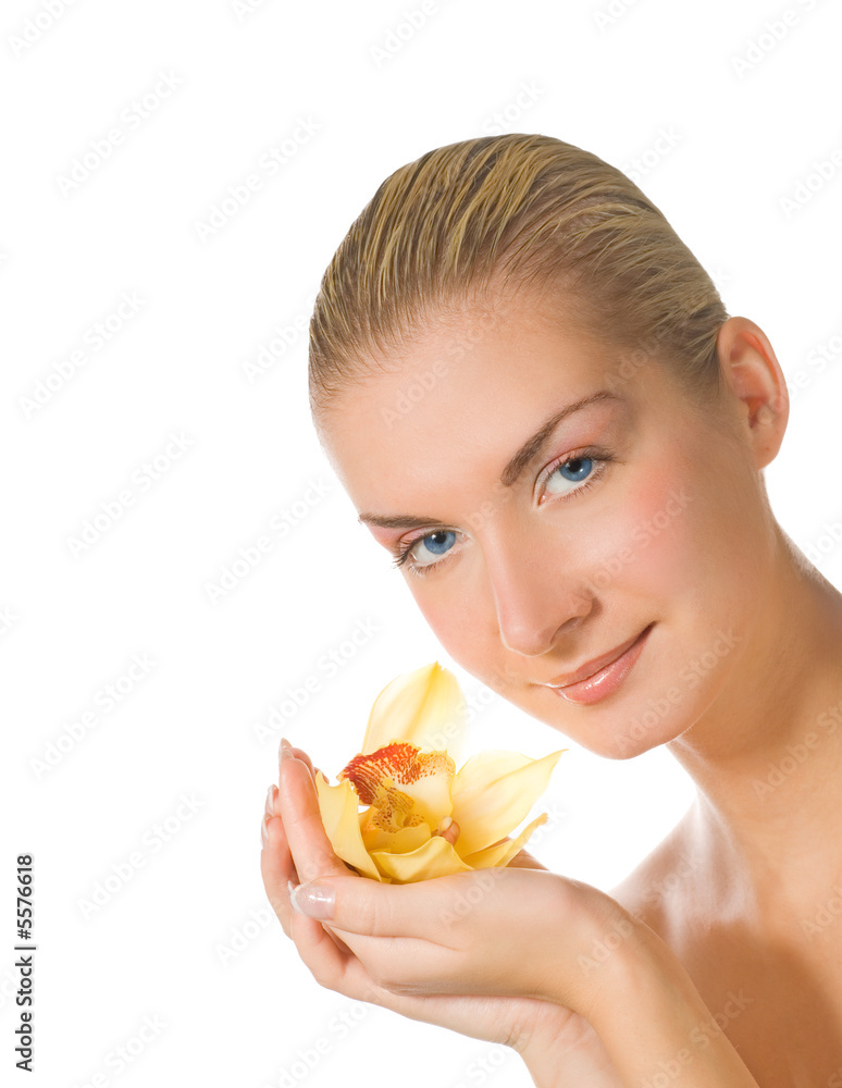 Beautiful girl with yellow orchid isolated on white Beautiful girl with yellow orchid isolated on white