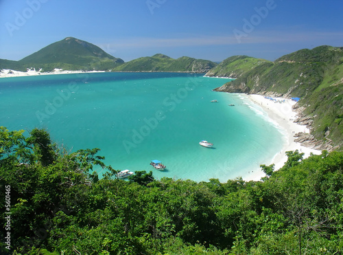 Boats over a crystalline turquoise sea in Arraial do Cabo