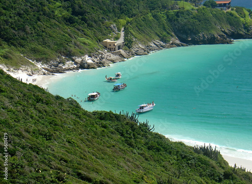 Boats over a crystalline turquoise sea in Arraial do Cabo