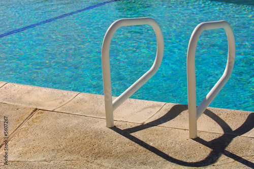 Background Image of a Common Pool Ladder by The pool
