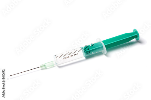 syringe filled with transparent liquid isolated on white