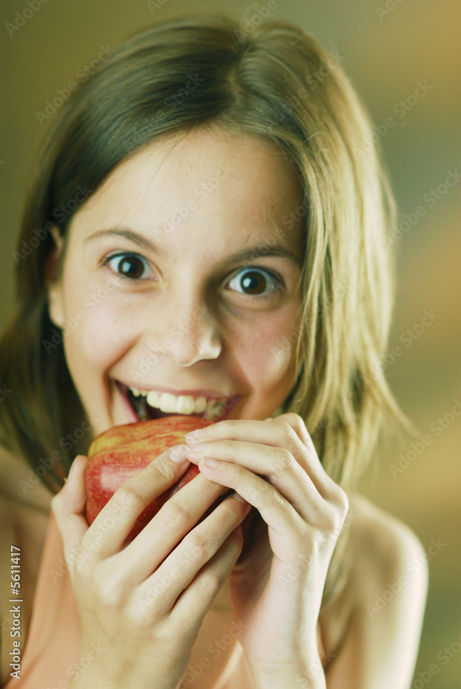 A girl with an apple A girl with an apple