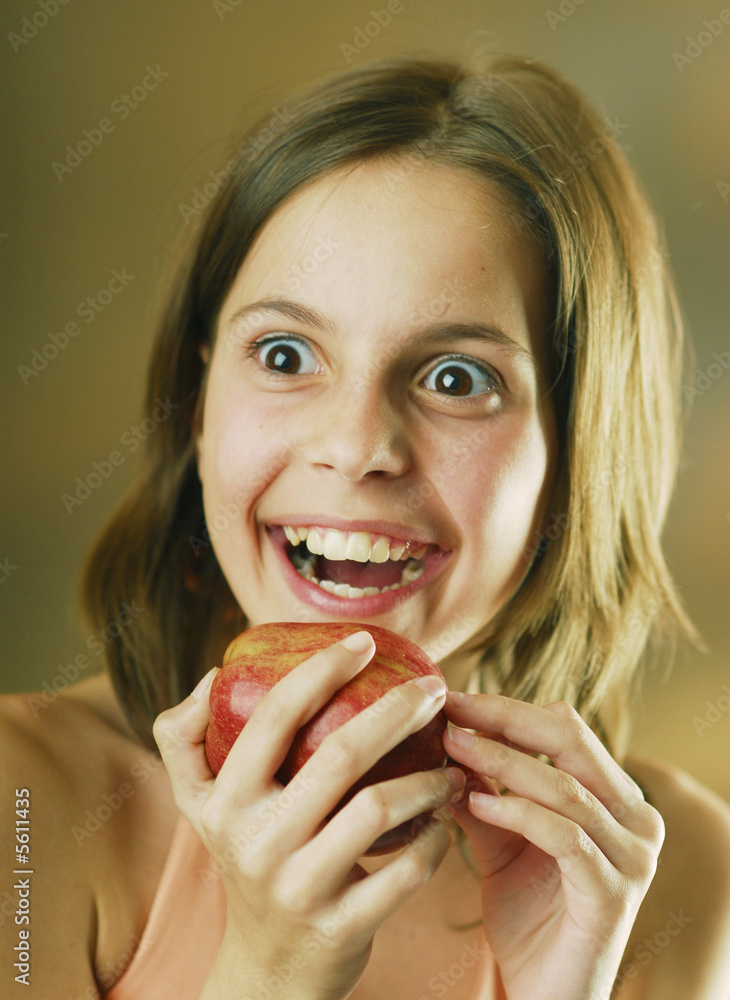 A girl with an apple A girl with an apple
