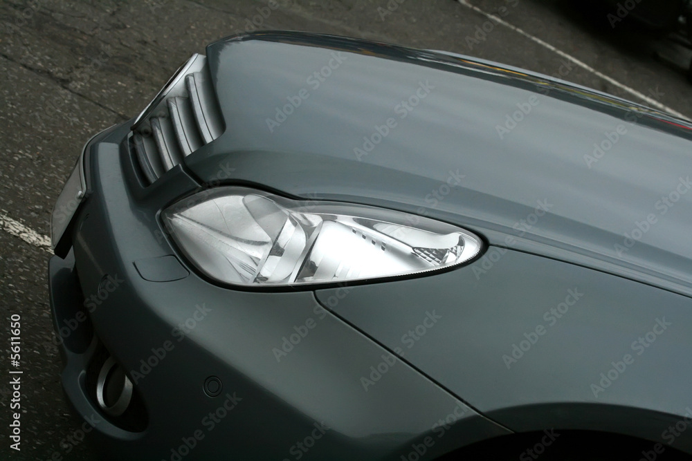 grey car bonnet and headlight