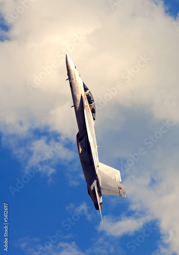 Fototapeta Naklejka Na Ścianę i Meble -  Beautiful Image of F-18 going vertical in blue sky