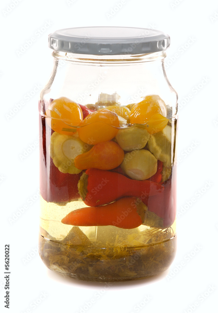 marinated vegetables in glass jar isoalted on white marinated vegetables in glass jar isoalted on white
