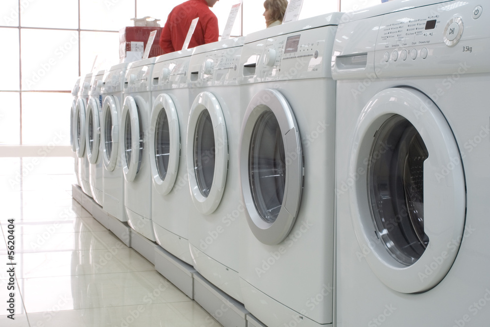 Rows of clothes washers in a store 2 Rows of clothes washers in a store 2