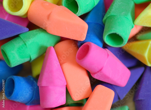 bright colored pencil eraser tops stacked up