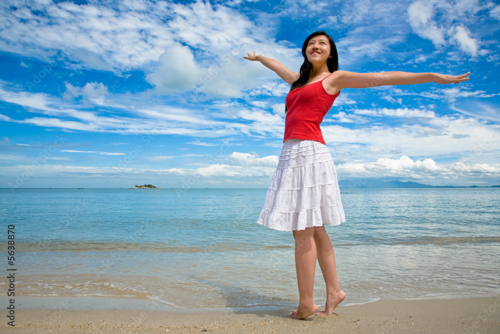 beautiful girl stretching on a beautiful day at the beach beautiful girl stretching on a beautiful day at the beach