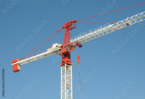 Red and White Cosntruction Crane photo