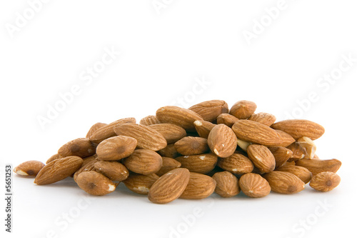 Pile of almonds isolated on white