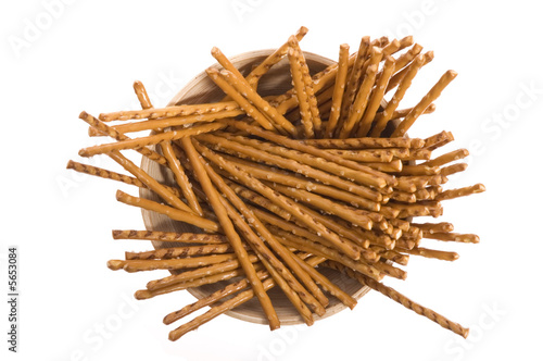 bowl of snacks isolated on the white backgound. sticks