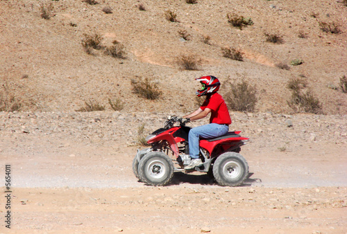 Quad ATV Rider in Desert