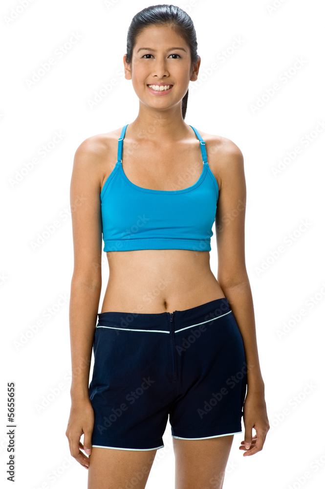 An attractive mixed-race woman in blue sportswear An attractive mixed-race woman in blue sportswear