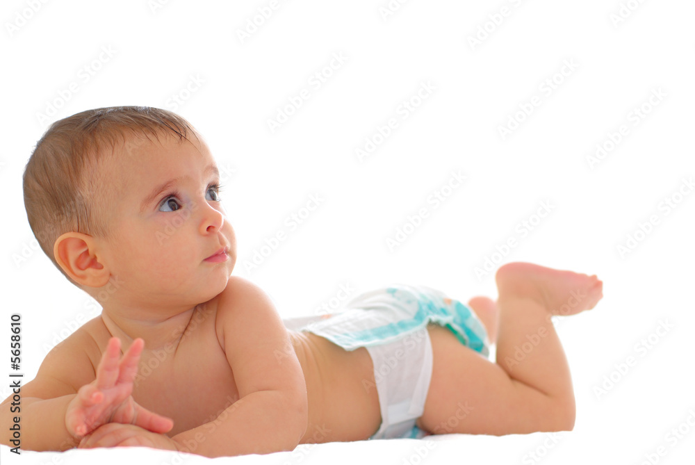 Sweet Baby on the bed using diaper . Sweet Baby on the bed using diaper .