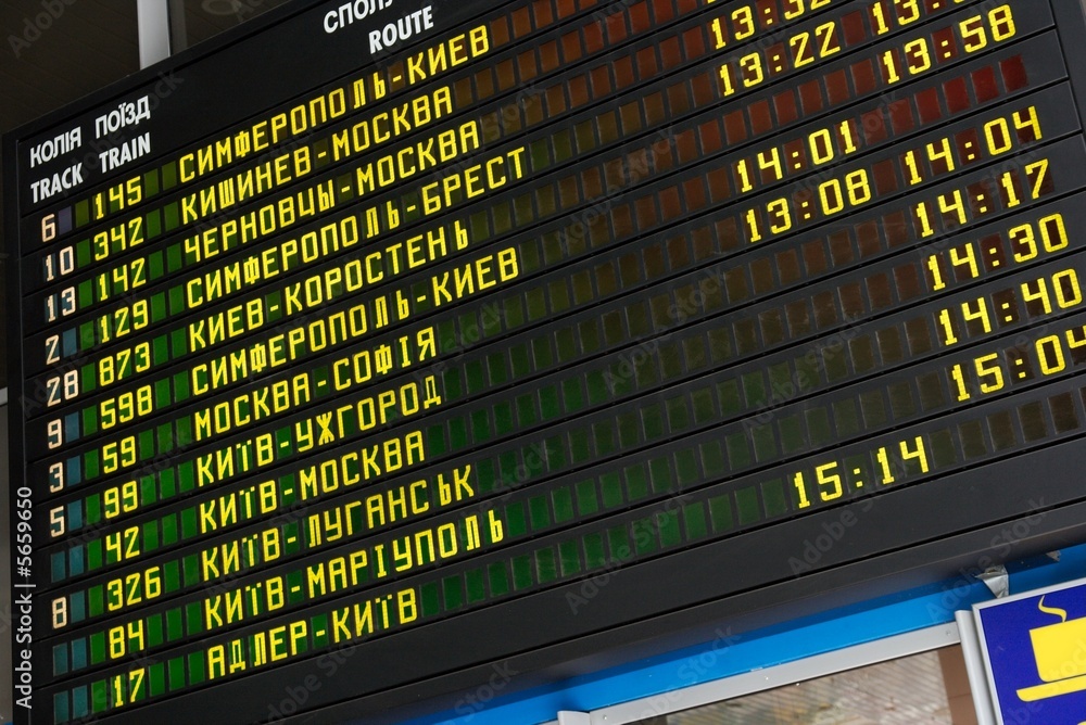 Fototapeta premium Schedule board of a railway station with cyrillic letters