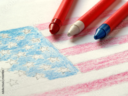Partially complete drawing of US flag with wax crayons