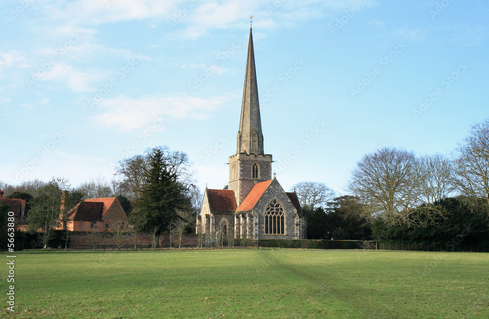 Medieval English Rural Church with a tall Steeple 