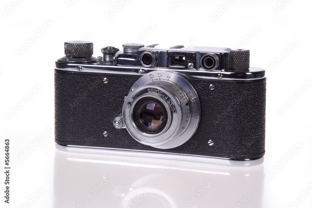 Classic film rangefinder camera on white background