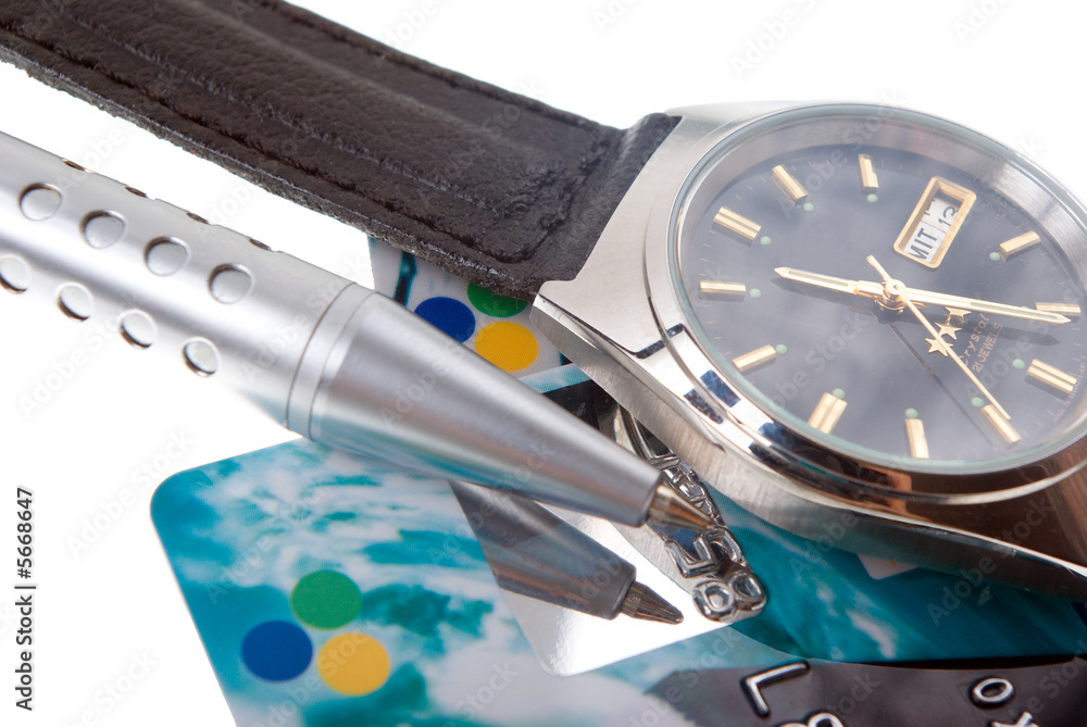 Fototapeta premium Close up of credit card .Wrist watch with dark dial