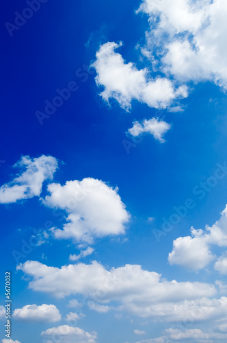 White clouds in the blue sky.