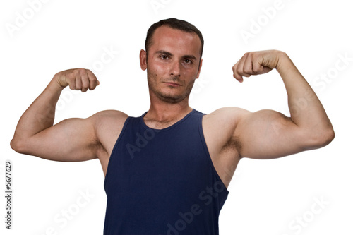 Muscular young man in a blue vest