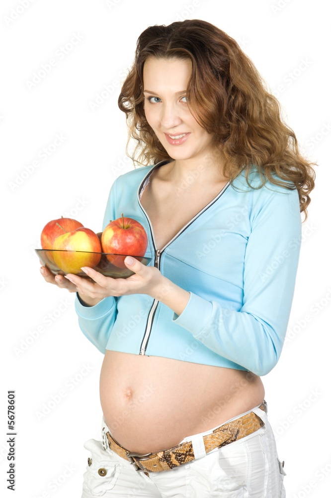 Pregnant women with apples. Isolate on white. Pregnant women with apples. Isolate on white.