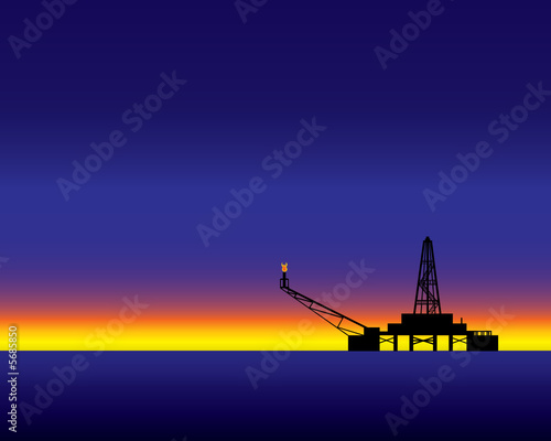 Oil rig at sunset