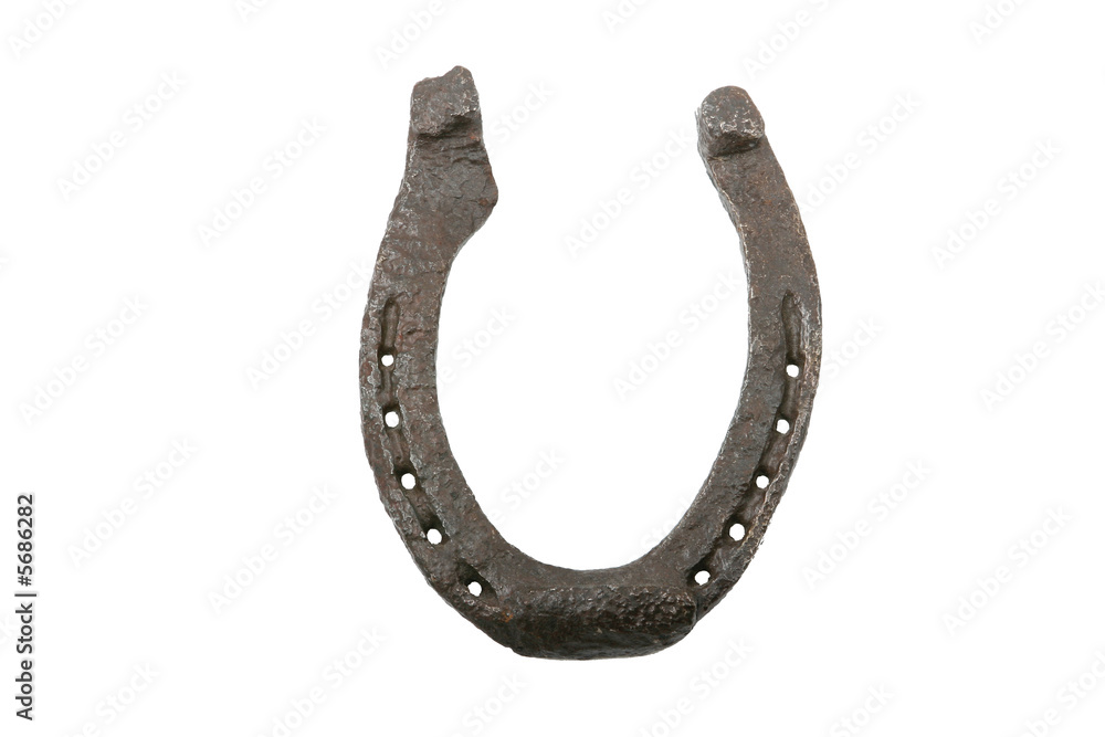 iron horseshoe with holes against white background iron horseshoe with holes against white background