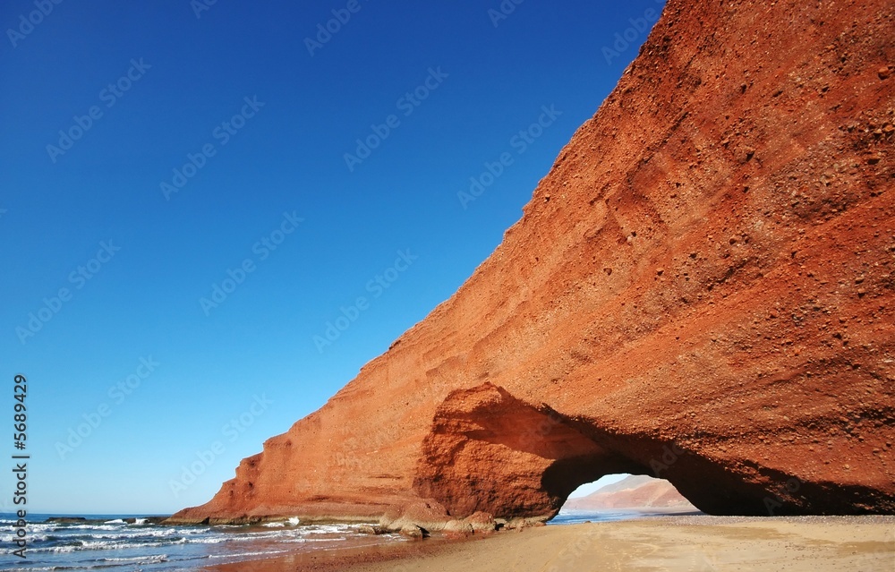 Arch rock formation on the beach. Morocco, Legzira.