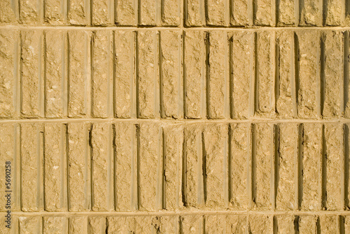 Sand stone wall texture with horizontal orientation photo