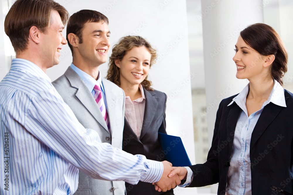 Business people are shaking hands confirming a sale Business people are shaking hands confirming a sale