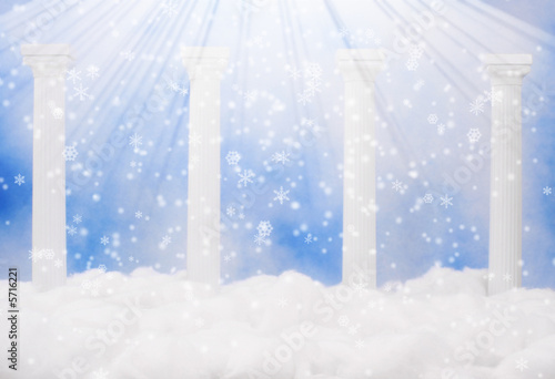 Fotografie Columns and Clouds With Blue Sky