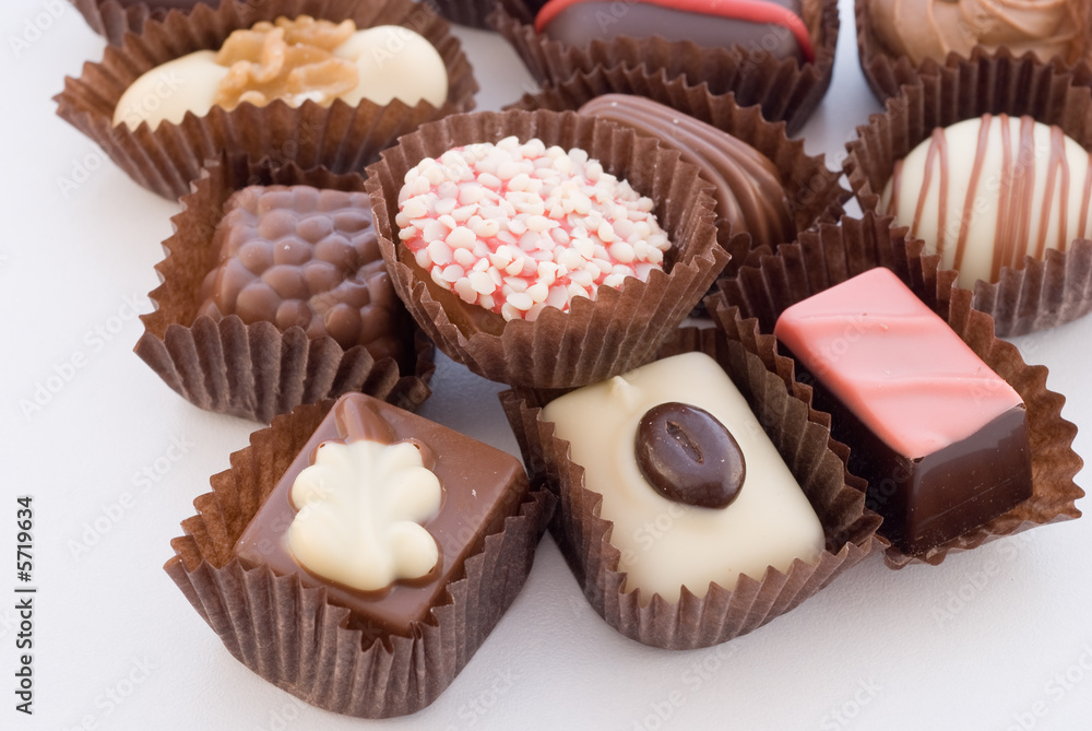 Close up of various colorful chocolat bonbons isolated on white Close up of various colorful chocolat bonbons isolated on white