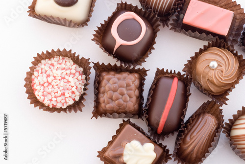 Close up of various colorful chocolat bonbons isolated on white