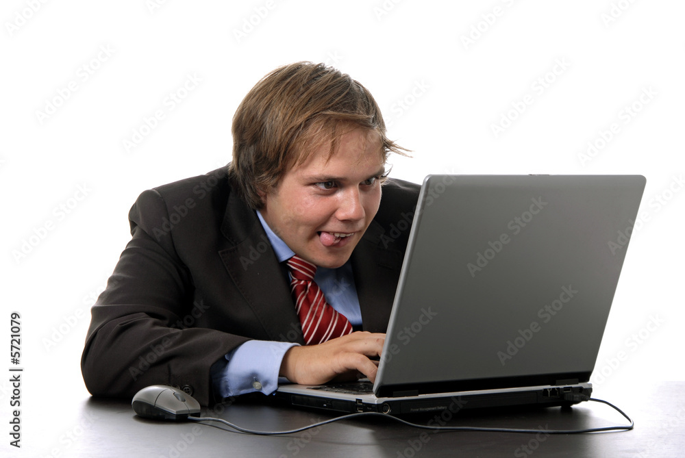 young man and working with is laptop young man and working with is laptop