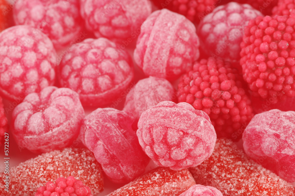 a close-up of various pink and red candy a close-up of various pink and red candy
