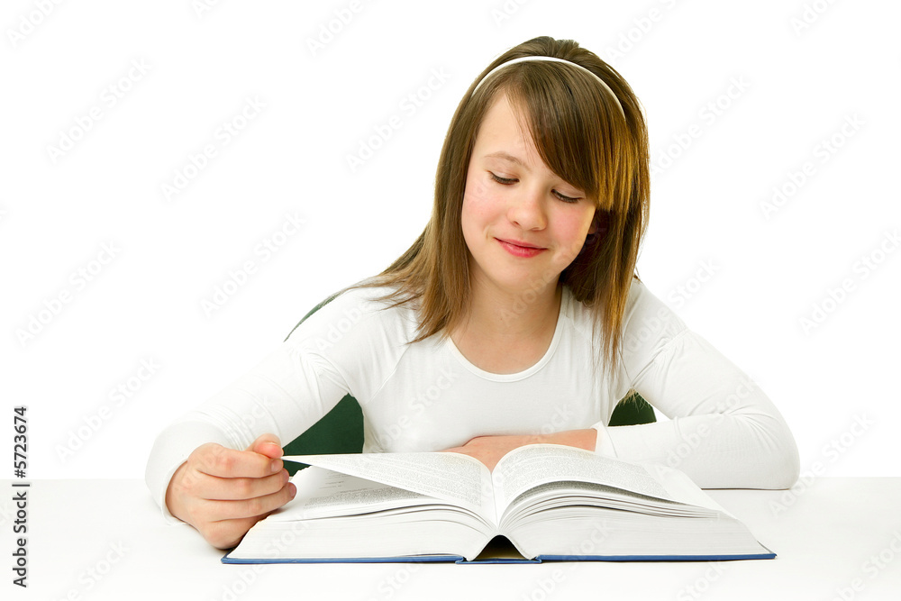 Portrait of Happy young schoolgirl reading book Portrait of Happy young schoolgirl reading book