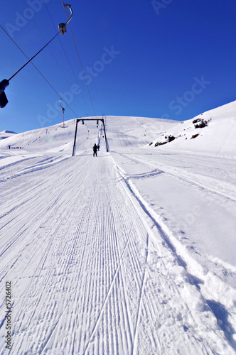 skilift in winter ski resort blue sky