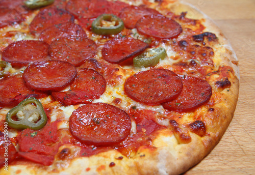 Pepperoni pizza with chiili peppers