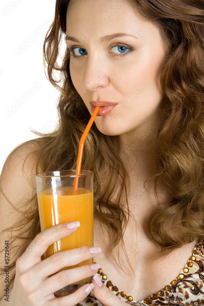 Attractive brunette drink orange juice. Isolate on white. Attractive brunette drink orange juice. Isolate on white.