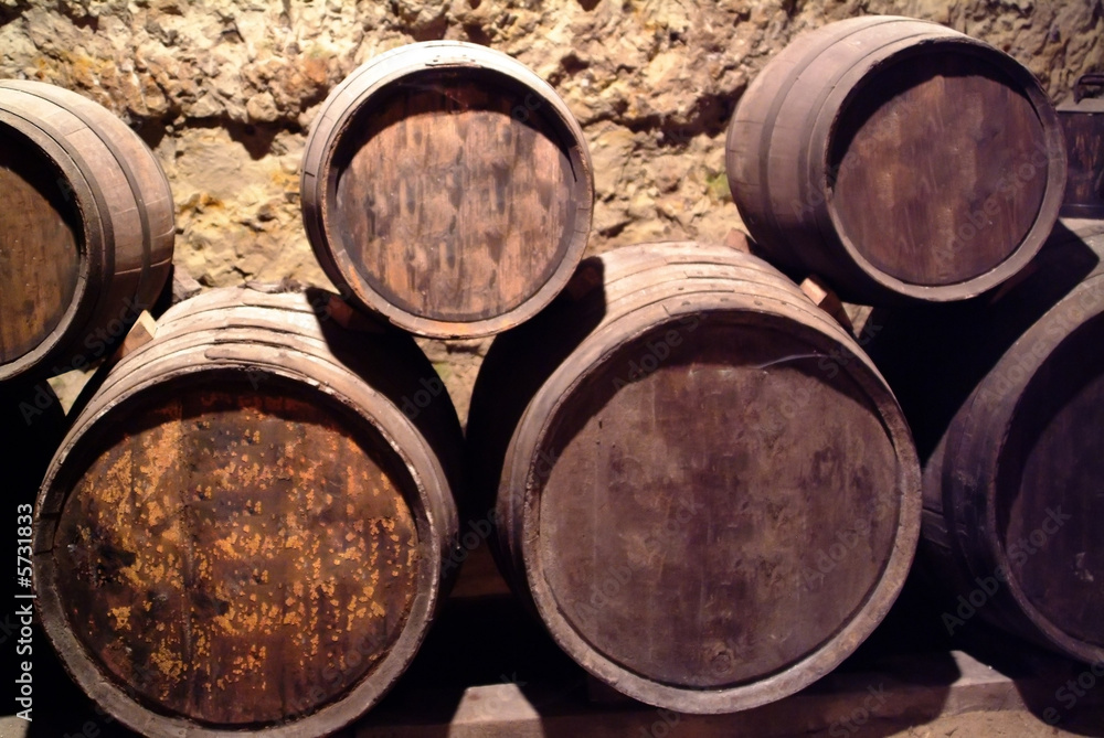 Barrels of wine in a cellar in the loire valley france. Barrels of wine in a cellar in the loire valley france.
